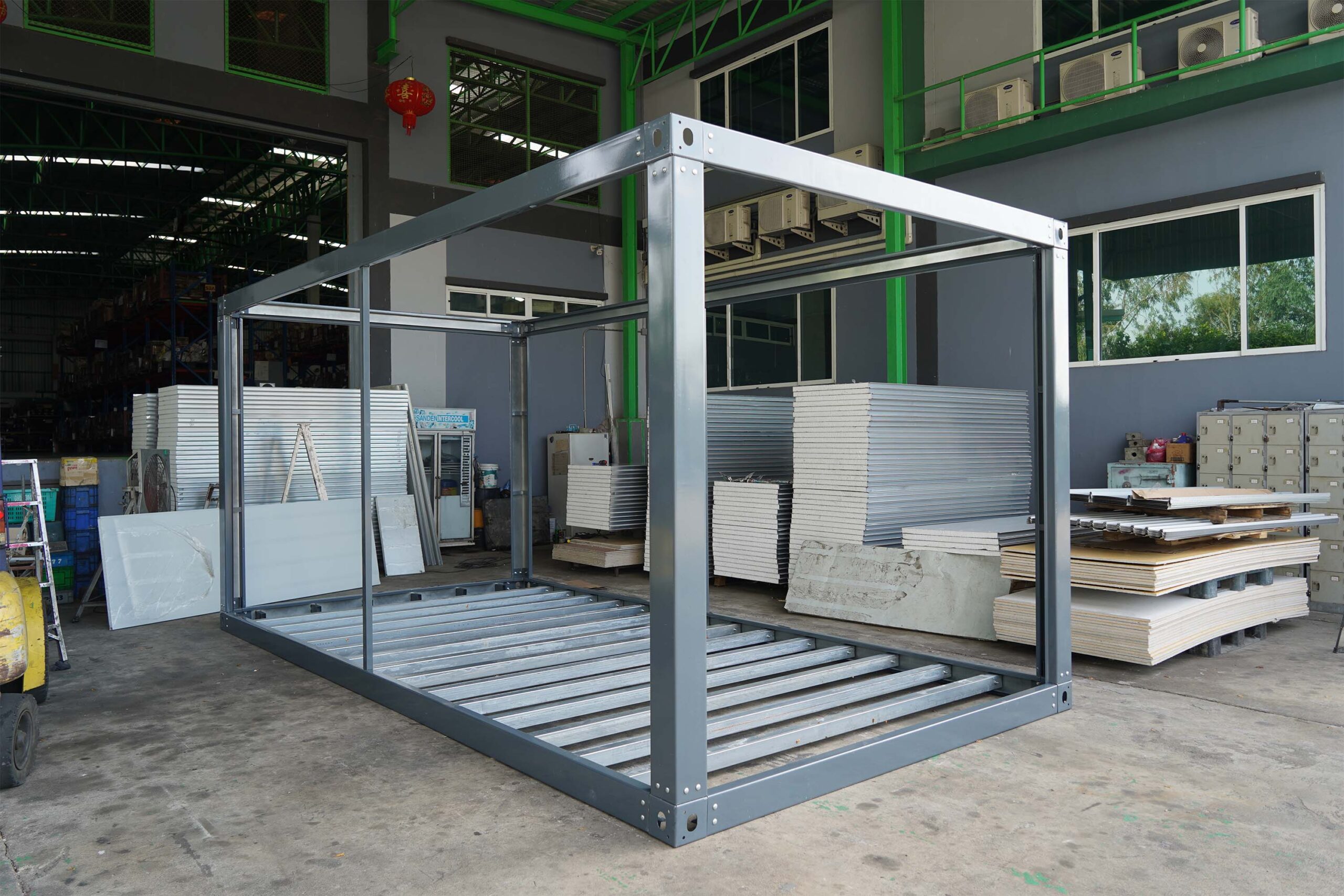 TheContainerTH two-story stacked container house with solar panels